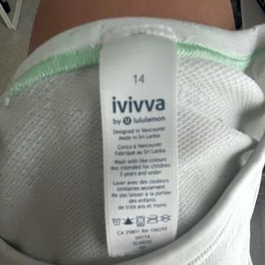 White Athletic Ivviva/Lululemon Top with flower.